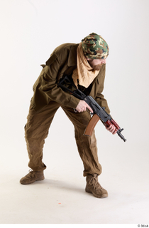 Andrew Elliott Pose with Gun aiming gun crouching standing whole…